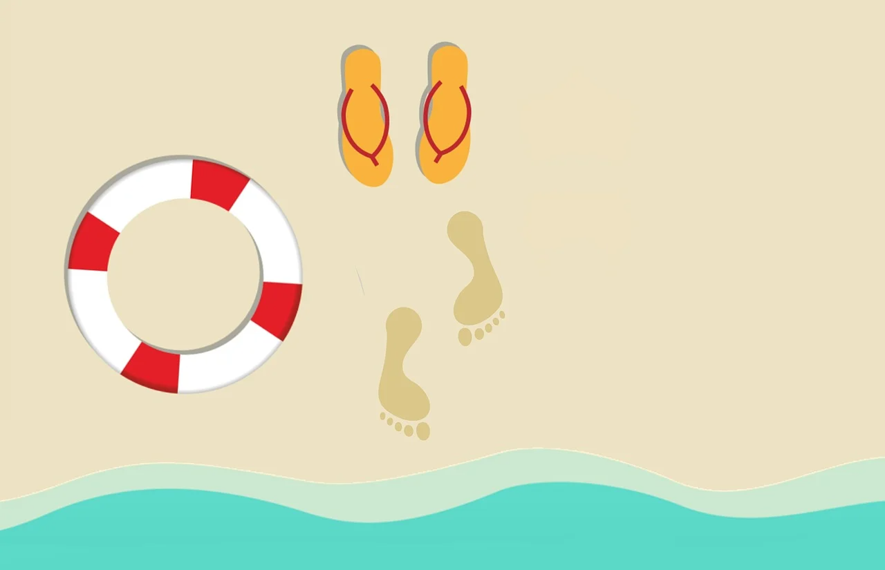 Beach scene with orange flip-flops, footprints in sand, red and white lifebuoy, and turquoise ocean waves